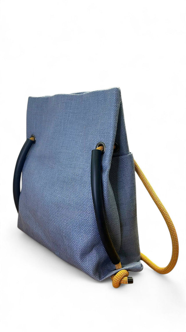Blue textile convertible bag with recycled climbing rope handle