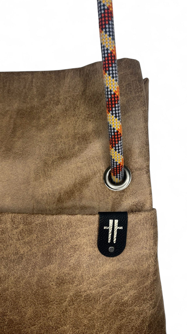 brown weathered faux leather convertible bag with recycled climbing rope