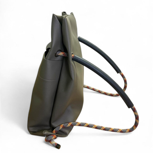 Convertible sustainable commuter backpack by Ditto in subtle reclaimed oilve-grey faux leather & recycled climbing ropes handles