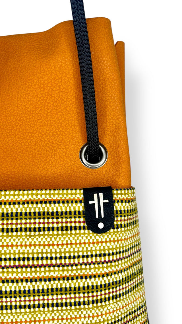 Orange pleather one of a kind bag - sustainably made commuter bag that transforms to a backpack