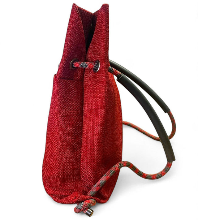 Side view of Ditto crimson red textile 2in1 sustainable bag with recycled climbing rope handle