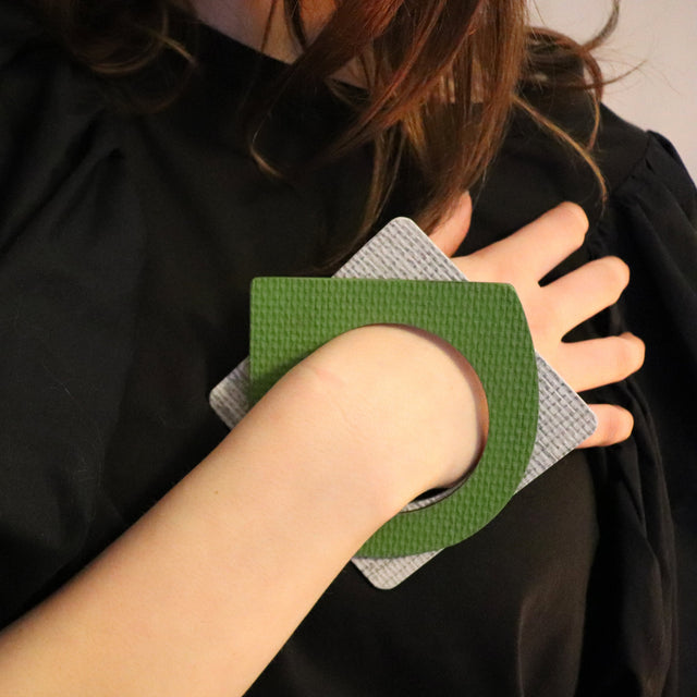 linoleum bangle stacked on wrist