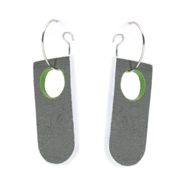 Pair of earrings with gray arch-shaped pendants and green centers on a white background