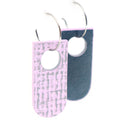 Pair of reversible earrings with one side in pink and grey, the other in navy blue  on a white background
