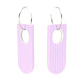 Pair of lilac recycled linoleum earrings with silver hooks on a white background