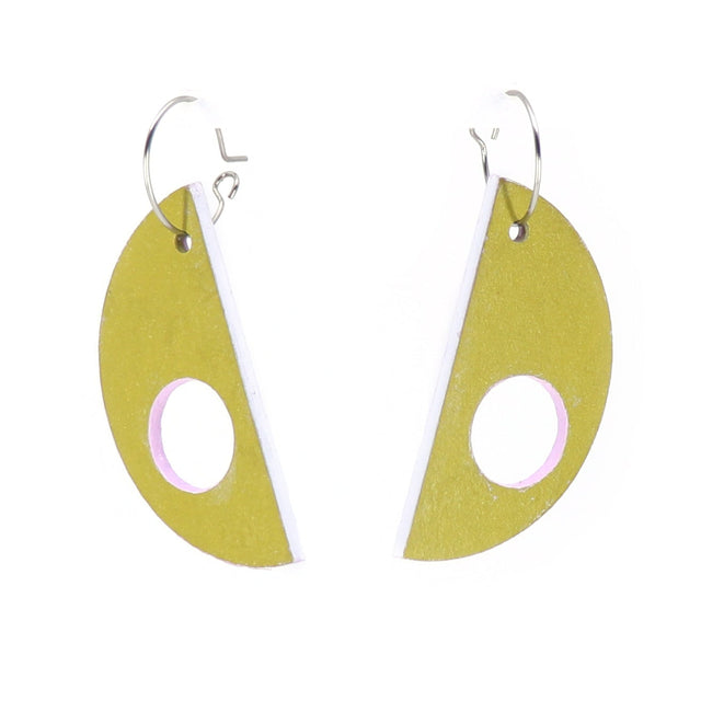 Pair of green leaf-shaped earrings with a white and pink outline on a white background