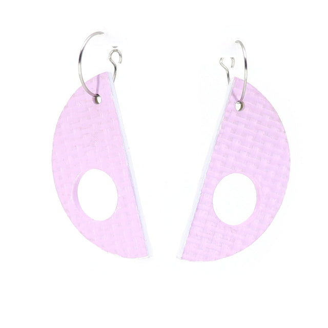 Pair of pink teardrop-shaped earrings on a white background