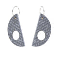 Pair of gray earrings with a geometric design on a white background