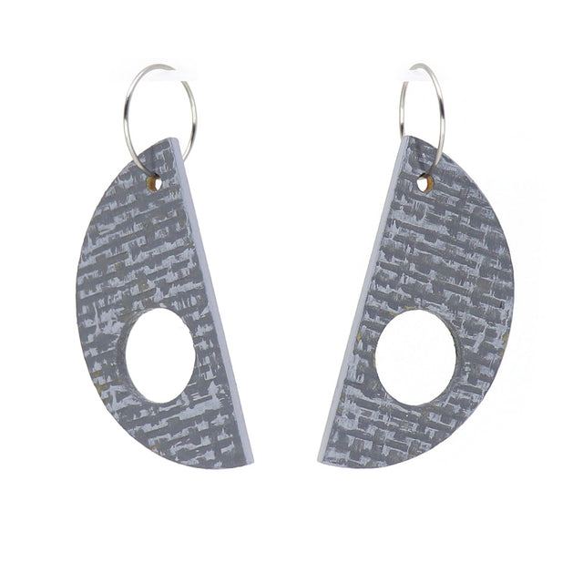 Pair of gray earrings with a geometric design on a white background