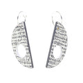 Pair of geometric earrings with textured design on a white background