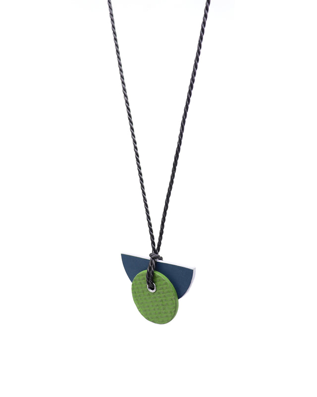 Bauhaus pendant necklace in navy and green linoleum on twisted grey string