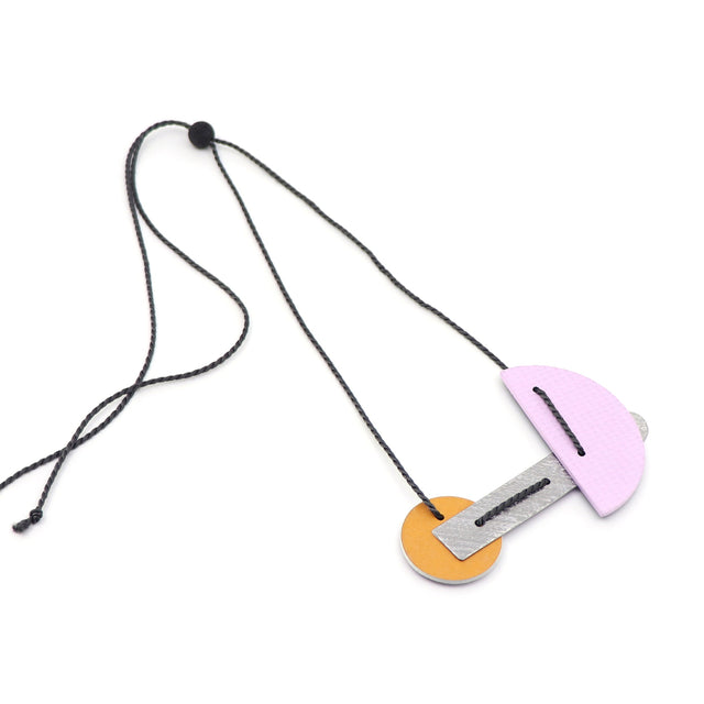 Necklace with a unique pendant on a white background