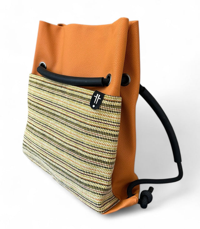 orange striped sustainable ditto convertible backpack with upcycled climbing rope and reclaimed materials