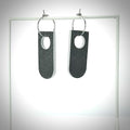 rotating grey and white linoleum earrings