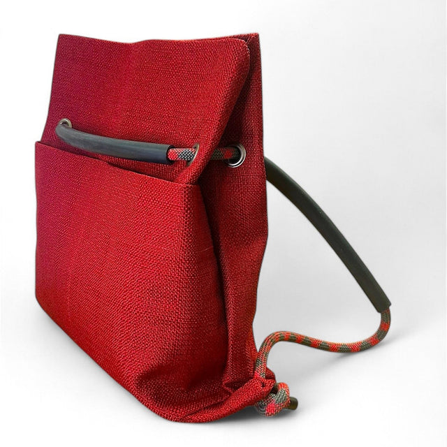 crimson red textile convertible ditto bag with recycled climbing rope handle and 2 front pockets