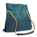 Ditto teal textile convertible bag with 2 front pockets and recycled climbing rope handle